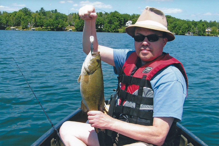 Gary catching a fish